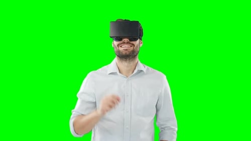 Man Using VR Headset on Green Screen
