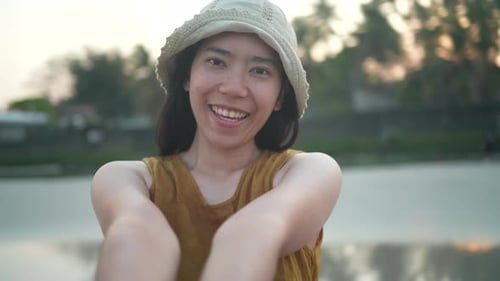 Asian woman happy and relaxing in freedom vacation time at the tropical san beach