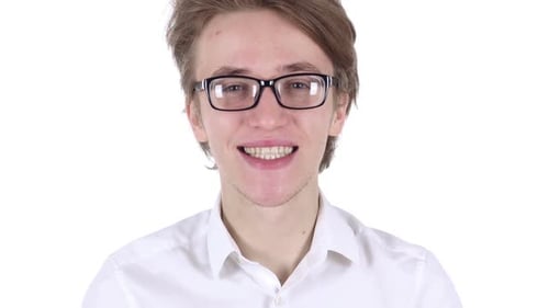 Smiling Man in Glasses Looking at Camera in Office
