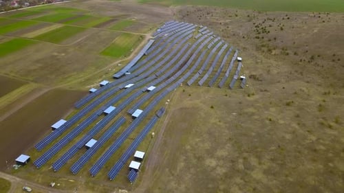 Solar Panels Farm (solar cell). Renewable green alternative energy concept - Aerial view