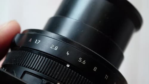 Hand Holding Vintage Camera Close Up