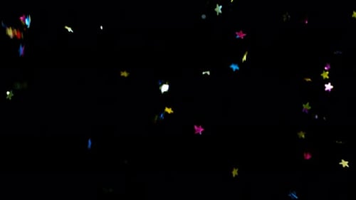Falling Colorful Star Confetti on Black Background
