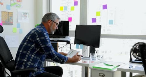 Man Working on The Desk at Home 4k