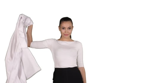 Attractive Female Doctor Walking and Taking Off Her White