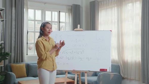 Enthusiastic Woman Teaching Math at Home