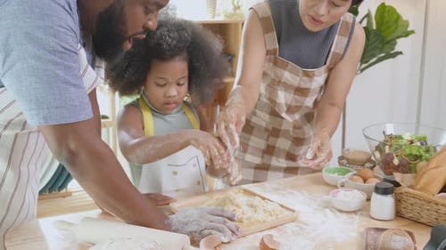 Family Cooking Together at Home Making Dough