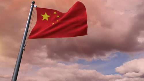 Chinese Flag Waving Against a Cloudy Sky