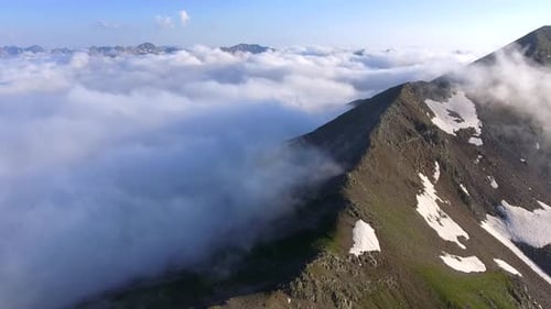 Condensed Moist Air on Mountain Ridge