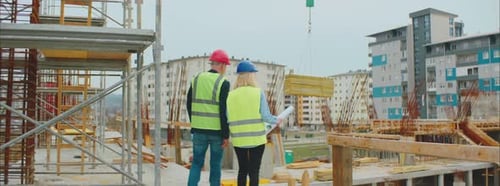 Engineers Checking Blueprints