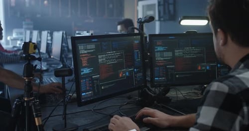 Programmer Working in Common Office