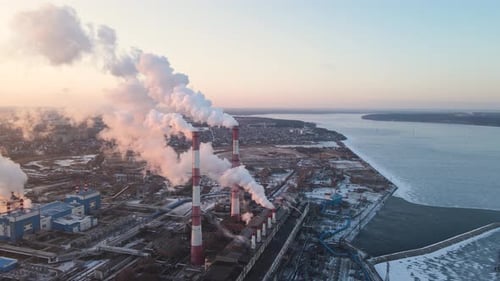 Aerial of factory chimney smoke building steam thermal power plant