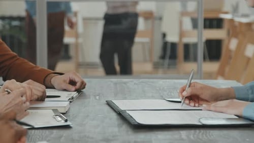 Employees Working Together in Office Meeting