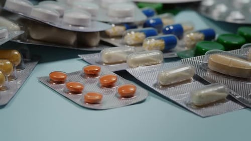 Assorted Medication Pills and Capsules in Blister Packs