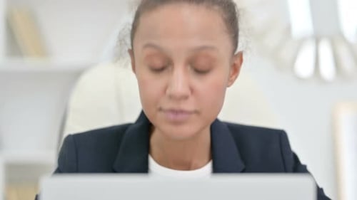 Close Up of Talking African Businesswoman Doing Video Chat on Laptop