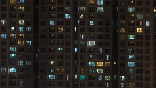 Timelapse of High-rise Apartment Block at Night