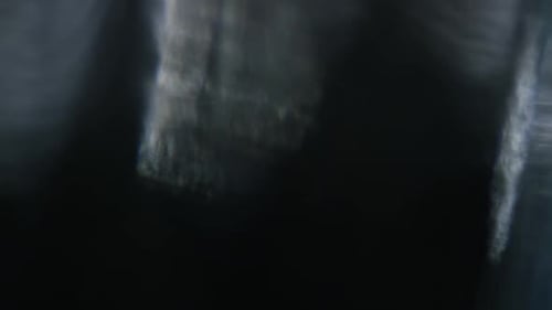 Abstract Light Patterns on Dark Textured Background