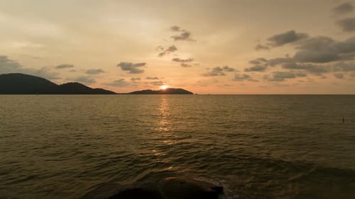 Sunset Behind Island