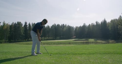 Summer Day, Man Playing Golf, Hits the Ball, View of Golf Course in Forest Area, Green Lawnm, Slow