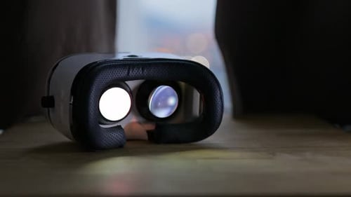 VR Headset on Table with Shifting Lens Display