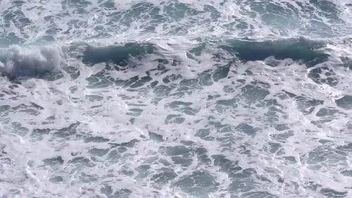 Rough sea waves splashing on the coast.