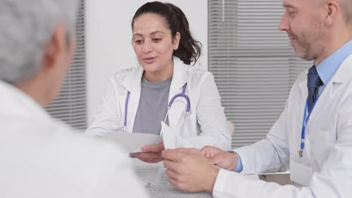Female Scientist Receiving Documents in Office