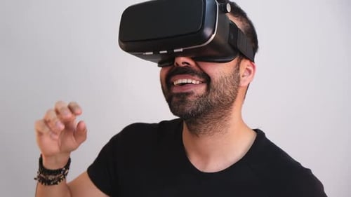 Man Wearing VR Headset Experiencing Virtual Reality