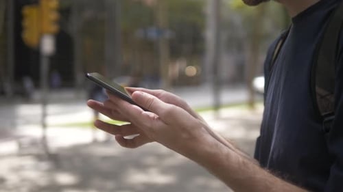 Close Up of Man Hands Using Mobile Smartphone at Home, Person Searching or Social Networks Concept