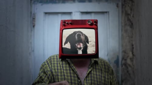 Man with Television Head Showing Snarling Dog