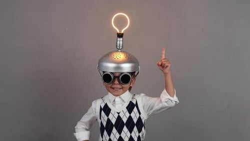 Boy Dressed as Scientist Has an Idea