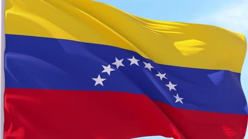 Venezuela Flag Waving Against Blue Sky