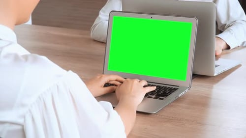 Female Fingers Typing on Computer in Office