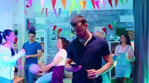 Friends Dancing Together at a Birthday Party