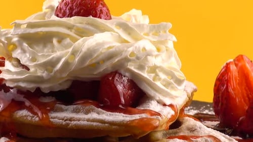 Delicious Waffles with Strawberries and Whipped Cream