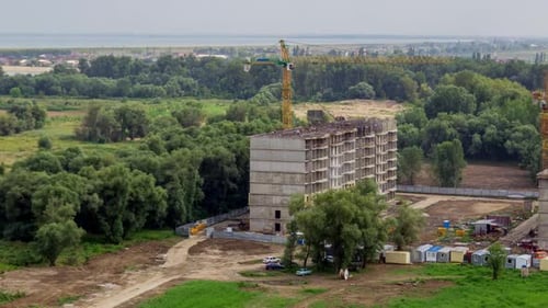 Timelapse of Construction Site. Cranes Working on Construct Building