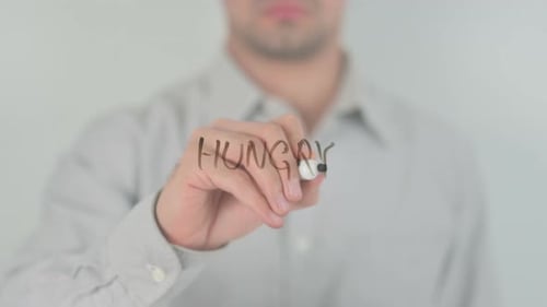 Hand Writing Hungary on Clear Surface