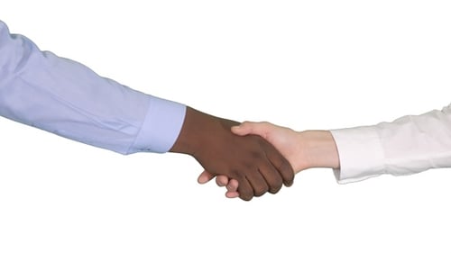 Business Handshake of Agreement on White Background
