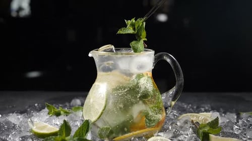 Citrus Fruit Drink with Mint on Crushed Ice