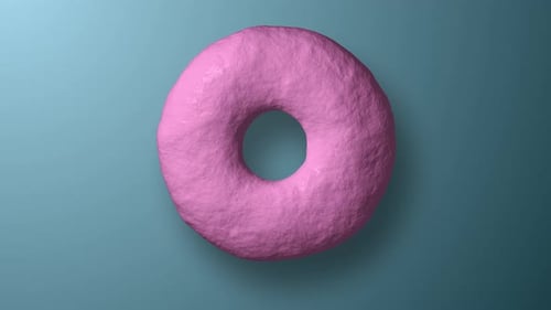Pink Donut Moves and Rotates on a Blue Background