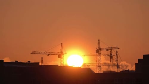 Construction Site at Orange Sunset