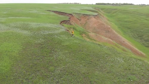 Erosion Gullies in Grassy Rural Landscape
