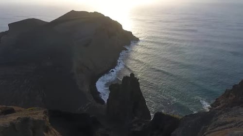Rocky coastline, the sight of a collapsed vulcano.