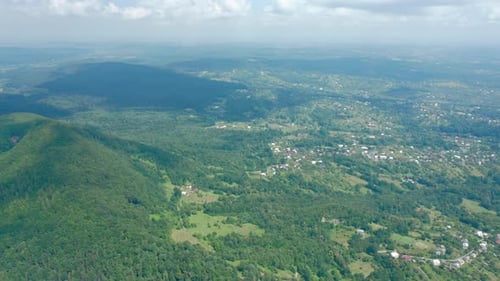 Aerial Drone View of a Village in a Mountain Valley.
