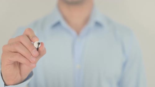 Man Writes Apply Now on Clear Surface