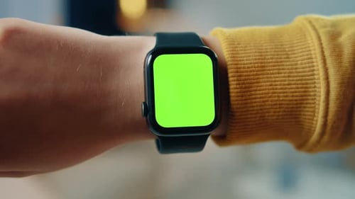 Woman Using Smartwatch with Chroma Key Closeup