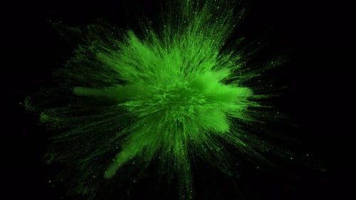 Green Color Powder Explosion on Black Isolated Background