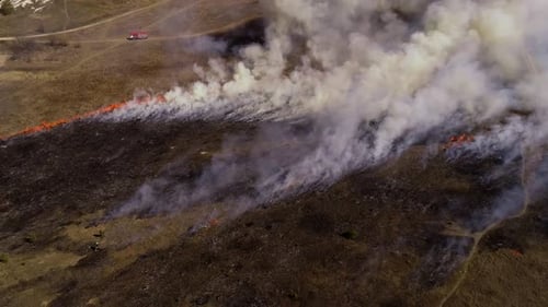 Devastating Wildfire Burning Across Rural Landscape