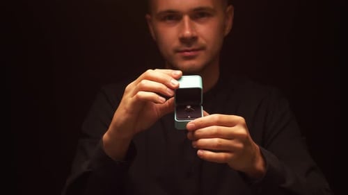 Young Adult Reveals Diamond Ring