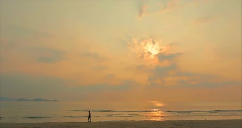 Young Man Athlete Go To the Length of the Beach at Sunset Background, Intense Cardio Exercise