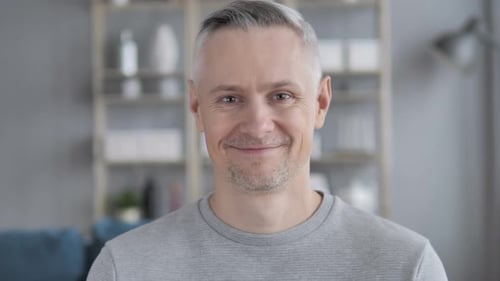 Portrait of Smiling Mature Man with Gray Hair