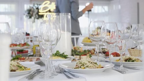 Banquet Table Served with Various Appetizing Snacks